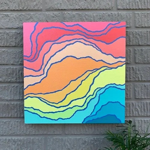 square rainbow gradient topography painting by artist hanging on concrete wall, Camille Gerrick